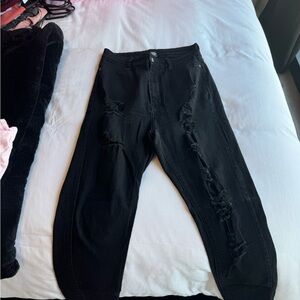 Black skinny jeans with rips